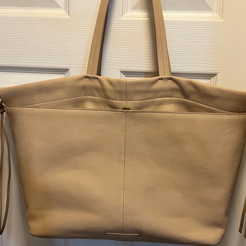 Lucky Brand beige leather purse.  New without tags. Smoke free home.